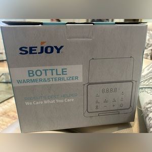 Bottle warmer and sterilizer, new never used